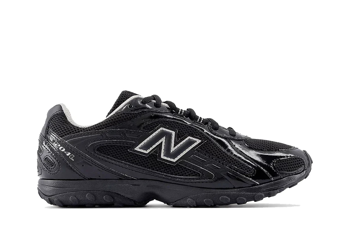 Tênis New Balance 204L Black Timberwolf Preto vista lateral